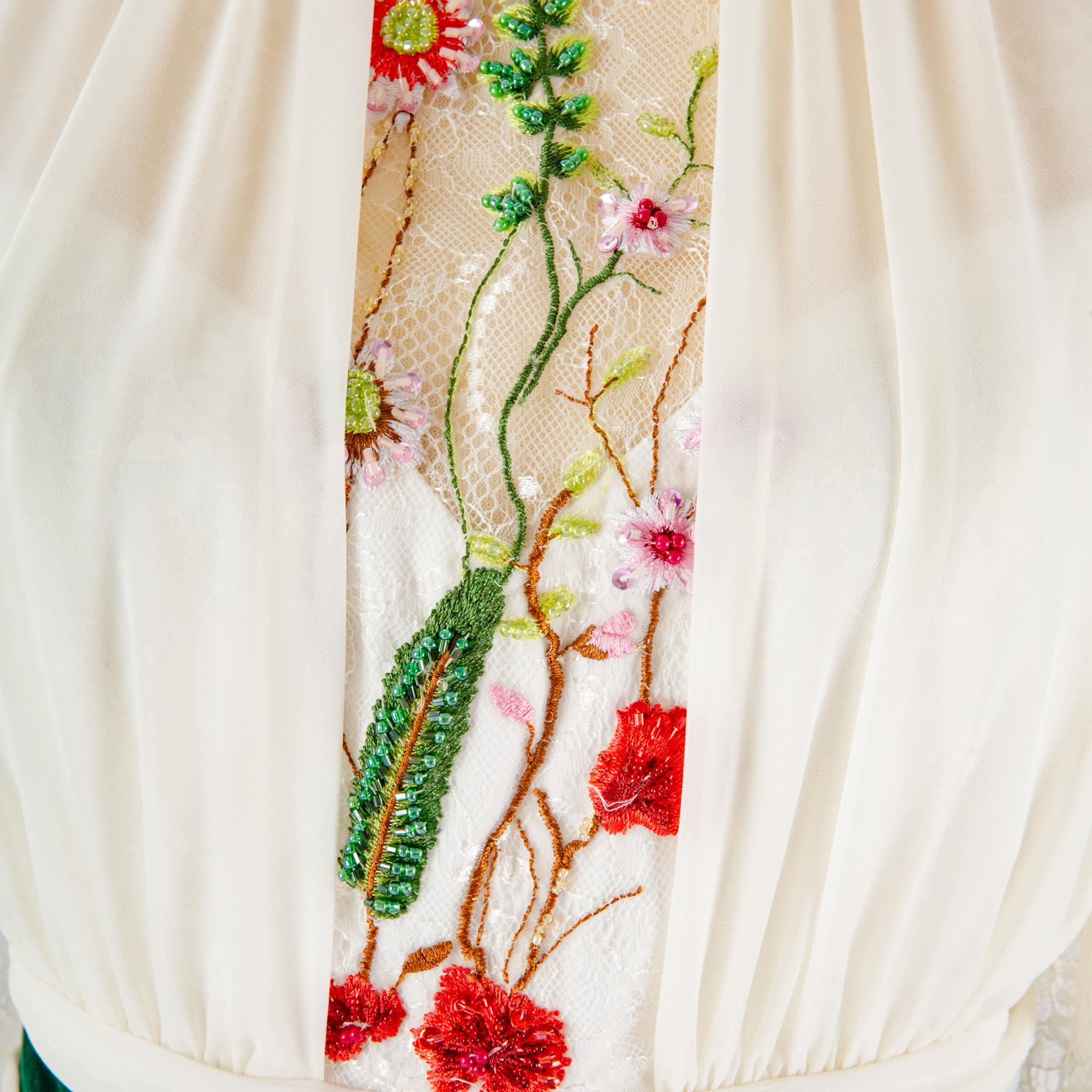Intricate floral embroidery on linen
